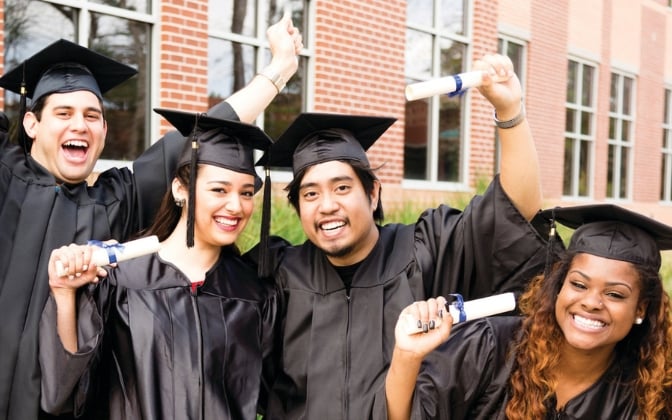 Student in graduation caps and gowns