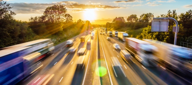 Vehicle driving down busy highway