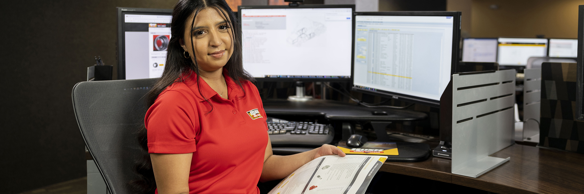 RushCare call center employee holding Parts Catalog